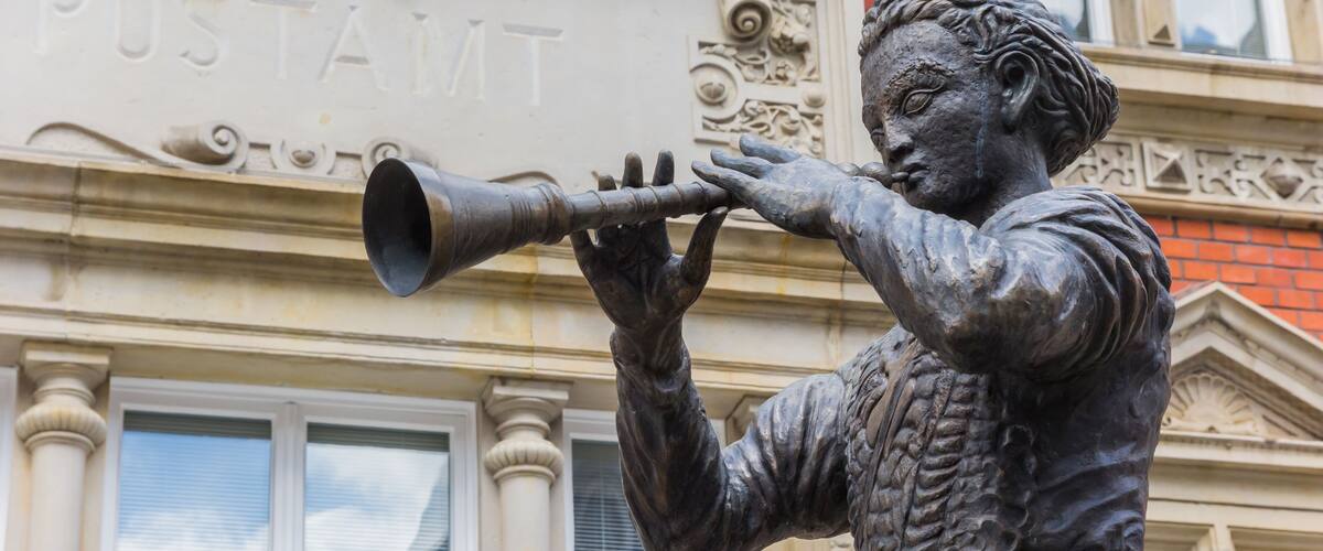 Statue of the Pied Piper of Hamelin in Hameln, Germany; Shutterstock ID 653268028