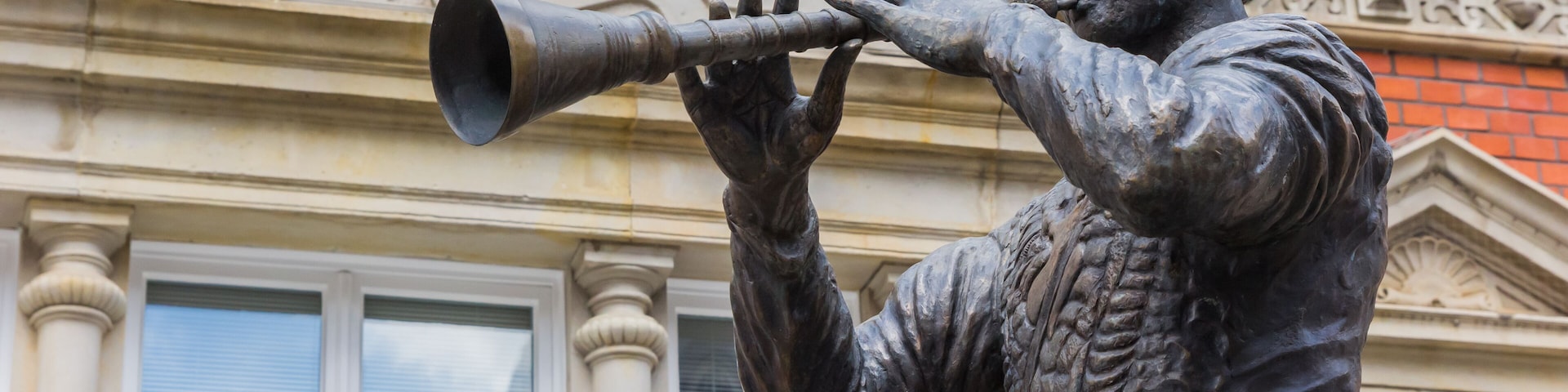 Statue of the Pied Piper of Hamelin in Hameln, Germany; Shutterstock ID 653268028