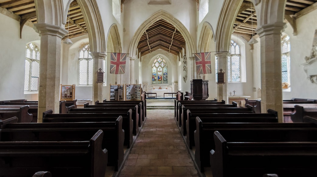 The church dates from the 14th century onwards, and consists of a west tower, nave with north and south aisles and clerestories, chancel, and north porch. Like many churches in the area it is built in flint with some ashlar and brick with lead roofs. The tower is 15th century with large buttresses and the nave aisles flanking it. There is a later brick embattled parapet. The north porch is of two storeys dating from the 15th century with a stair turret to the west. The nave has arcades of four bays with octagonal piers. The roof line from the 14th century is still visible on the tower. The roof was originally thatched. There were originally box pews in the nave and these were replaced along with a new pulpit in 1853. The chancel has a piscina and a three light east window with early Victorian stained glass. There are several good wall monuments. The church was declared redundant in the late 1980s and was accepted by the Churches Conservation Trust in 1995 who carried out restoration work.