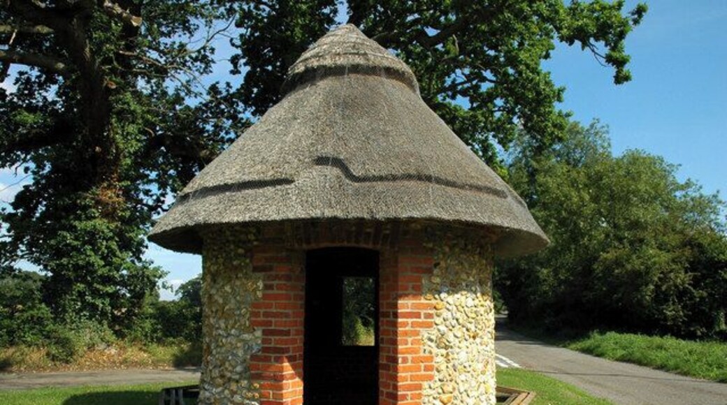 Thatched shelter on the village green at Merton, Norfolk, England