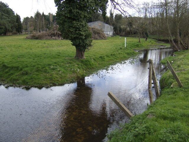 Stream at Mundford This stream drains the area to the east of Mundford around West Tofts and Lynford, flowing under the A1065 to join the Wissey about a quarter of a mile behind the camera.