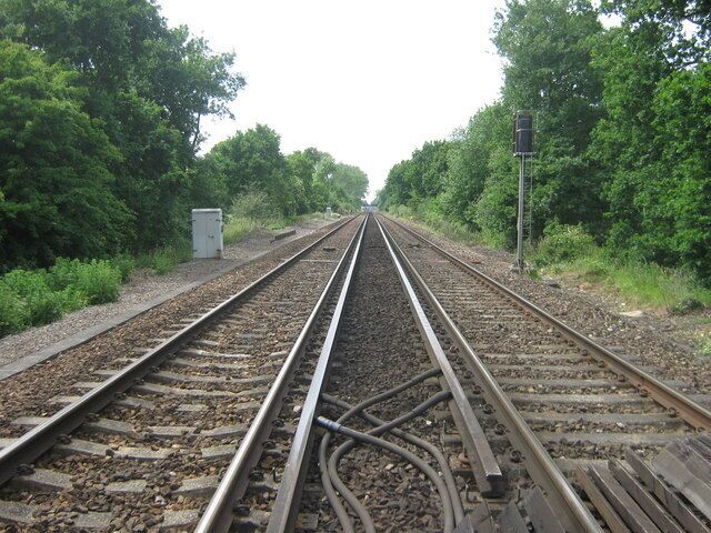 Railway to Paddock Wood As seen from level crossing near Queen Street. Line heads from Marden, Staplehurst and other stations from Ashford. Footbridge near Paddock Wood Station just seen in the background.