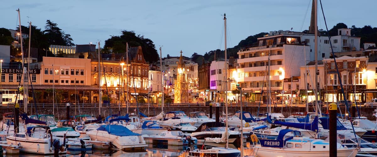 Torquay showing a marina, night scenes and boating