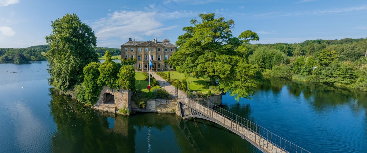 Wakefield, United kingdom. Walton Hall island and lake at Waterton Park in Wakefield West Yorkshire. Aerial view of the hall and island in the summer