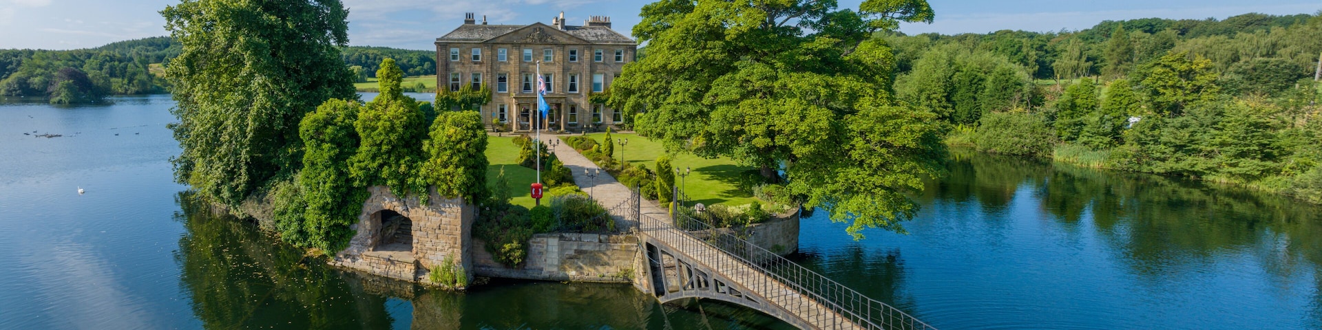 Wakefield, United kingdom. Walton Hall island and lake at Waterton Park in Wakefield West Yorkshire. Aerial view of the hall and island in the summer