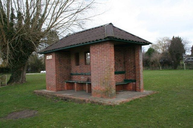 No buses here This reminds me of a bus stop only it's by the river at Benson.