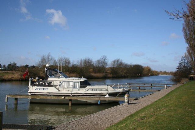 Moored on its own Rather expensive boat moored up on its own along the Thames path at Benson.