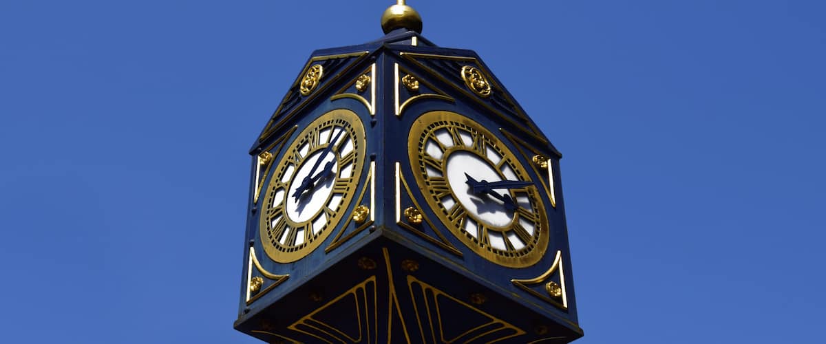 Big clock in Walsall on sunny day . Big clock on the blue sky in United Kingdom