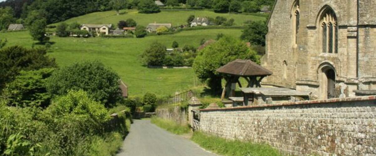 Horningsham Parish Church and view "The parish church was founded in the 12th century. The only part surviving from the Middle Ages is the perpendicular tower, and even this has undergone some restoration." The above was copied from: http://www.wiltshire.gov.uk/community/getcom.php?id=121