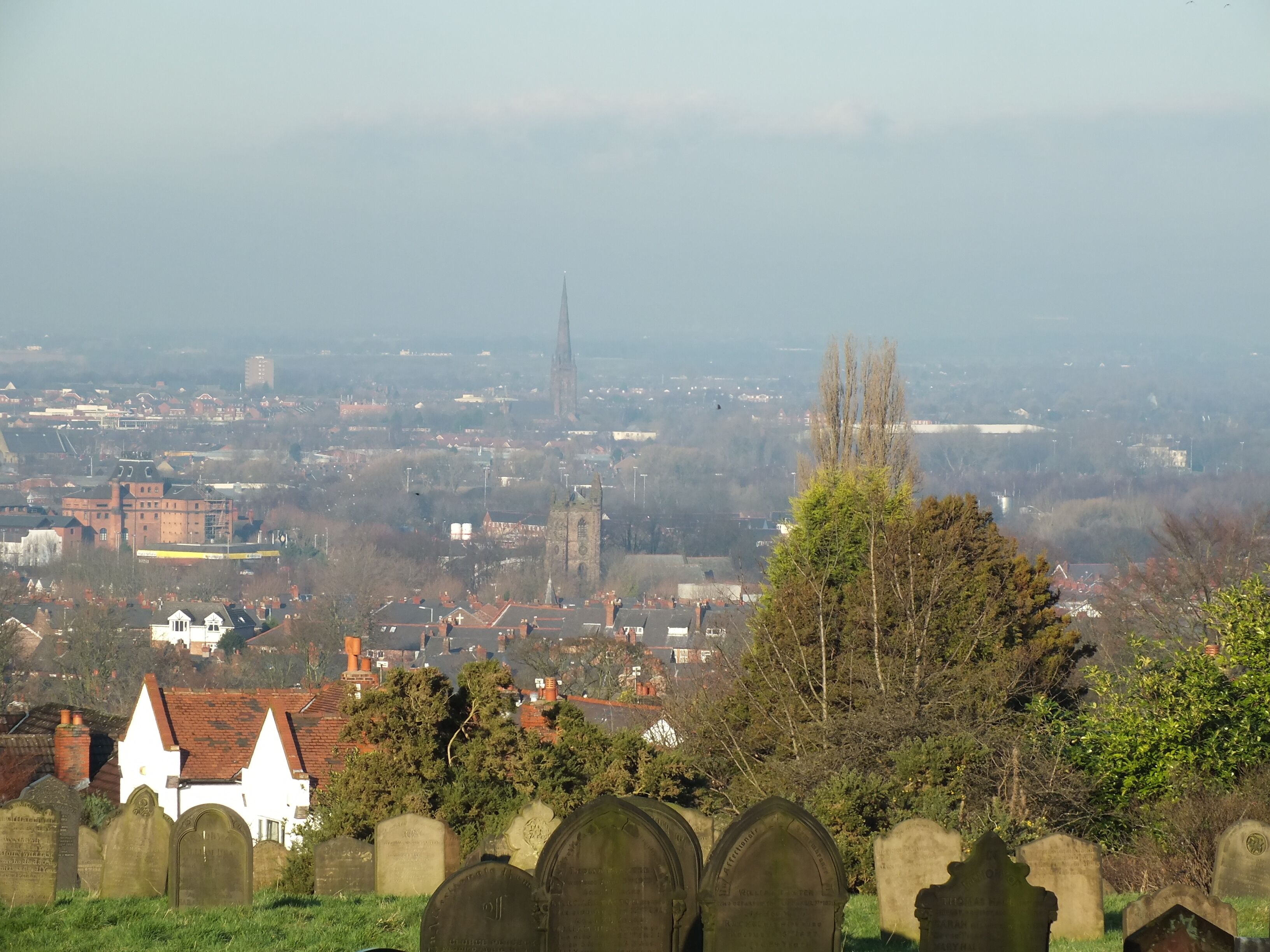Fox Covert Cemetery, Stockton Heath looking over Warrington. St Elphins Warrington behind St Thomas' Stockton Heath.