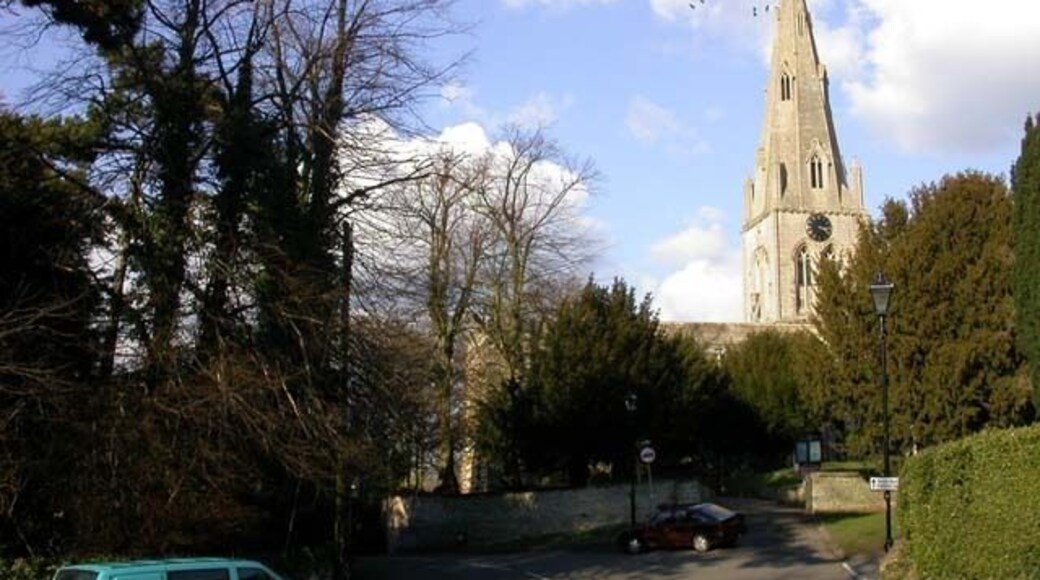 The junction of Cobbs Lane, Hickmire and Bell End in Wollaston, Northamptonshire. In the background are the tower and spire of St Mary the Virgin parish church.