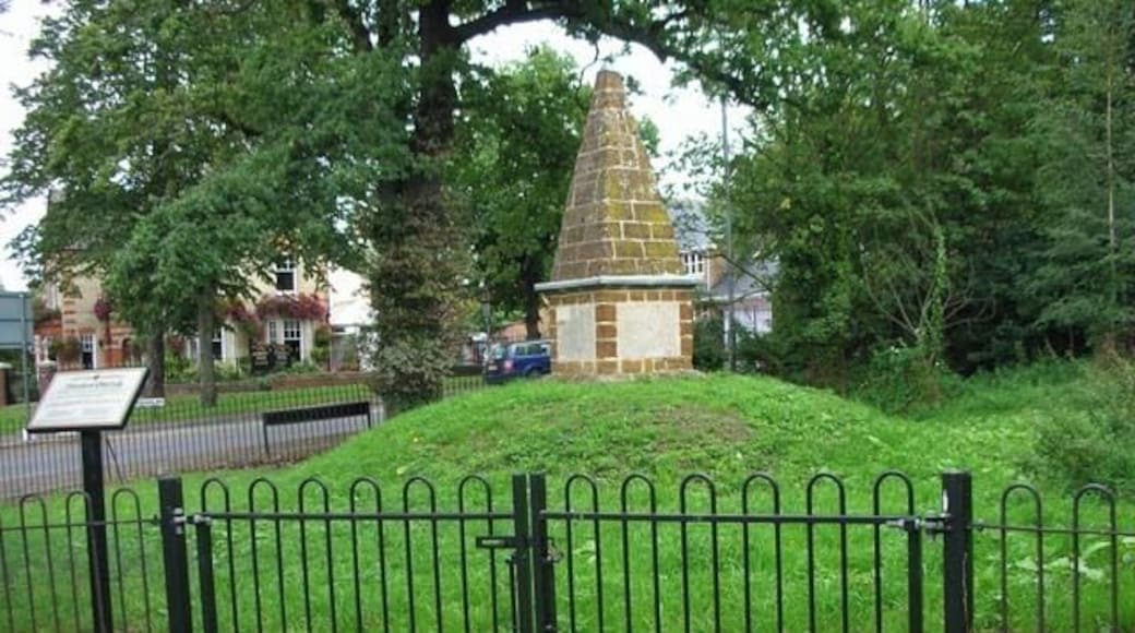 Finedon Obelisk. Erected by John English Dolben in 1789 at the cross-turnpikes (now the A6 and A510). It probably celebrated the recovery of George III from a period of insanity. The faces displayed verses to give delight, and gave distances to various destinations.