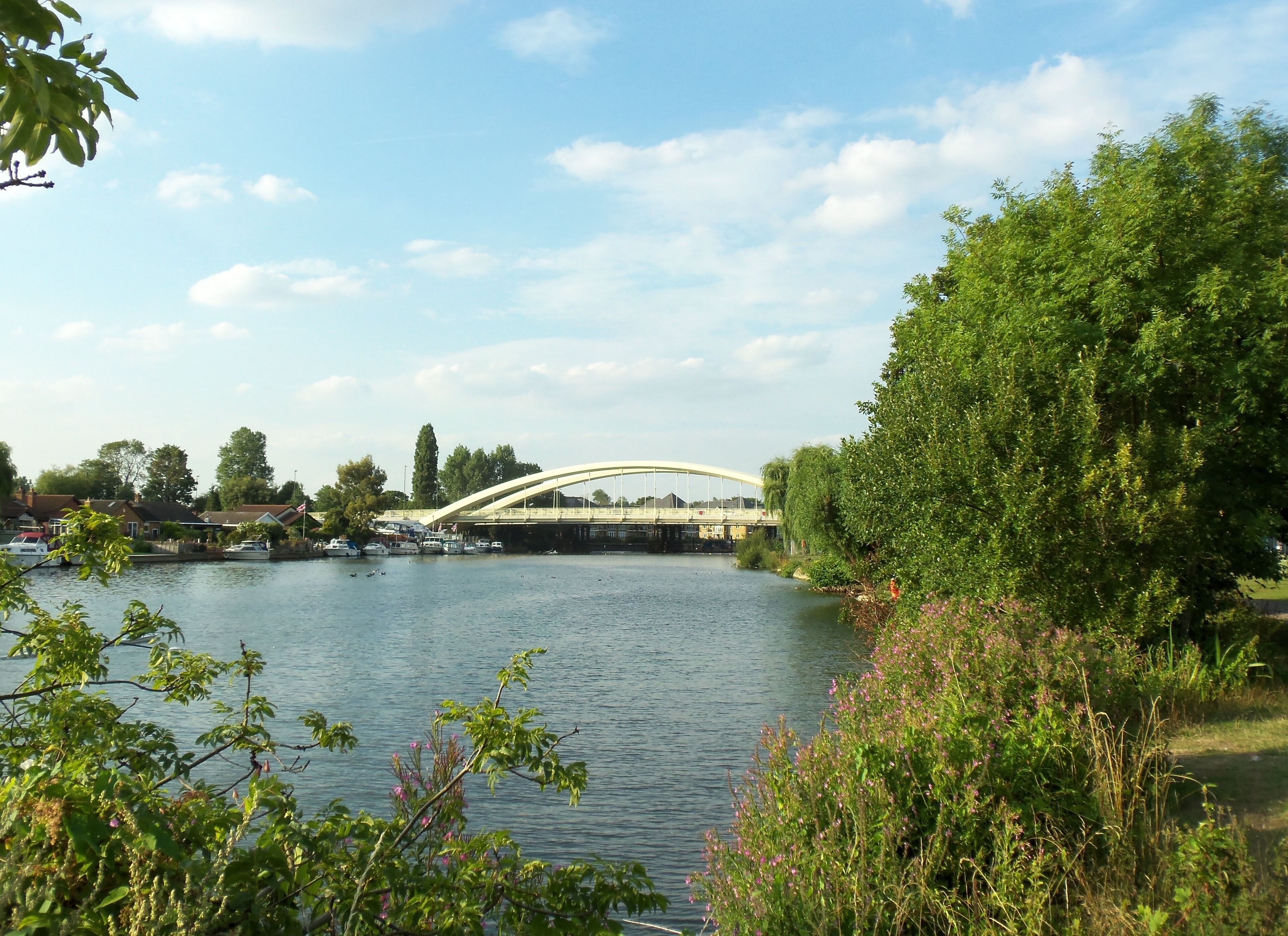 Walton Bridge between Cowey Sale, Walton-on-Thames and Lower Halliford, Shepperton on 7 August 2013 taken with Kodak EasyShareM580 and straightened. This is the only bridge open between the Surrey boroughs of Spelthorne and Elmbridge in the United Kingdom