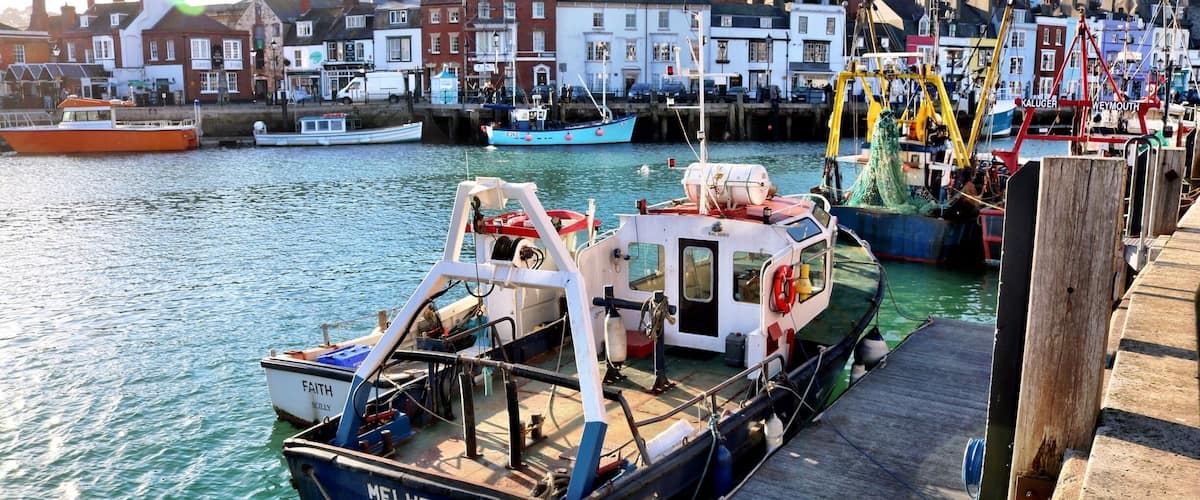 Weymouth Harbour and Marina. Sit outside the George Inn and watch the boats come and go.