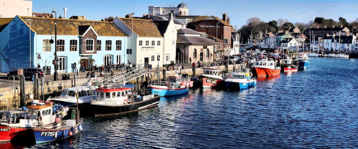Weymouth Harbour and Marina. Sit outside the George Inn and watch the boats come and go.