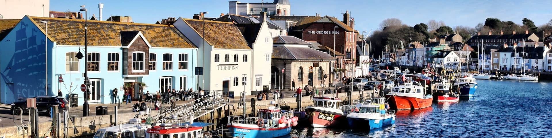 Weymouth Harbour and Marina. Sit outside the George Inn and watch the boats come and go.