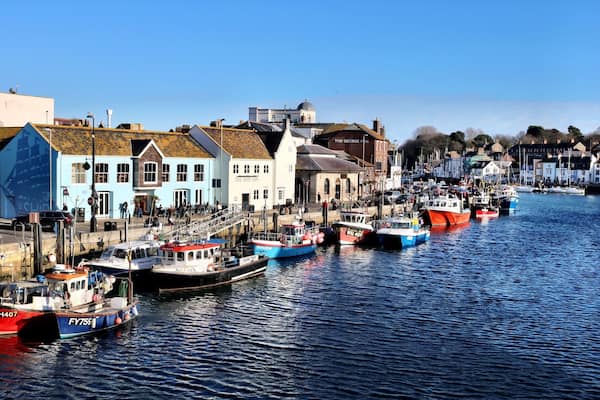 Weymouth Harbour and Marina. Sit outside the George Inn and watch the boats come and go.
