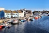 Weymouth Harbour and Marina. Sit outside the George Inn and watch the boats come and go.