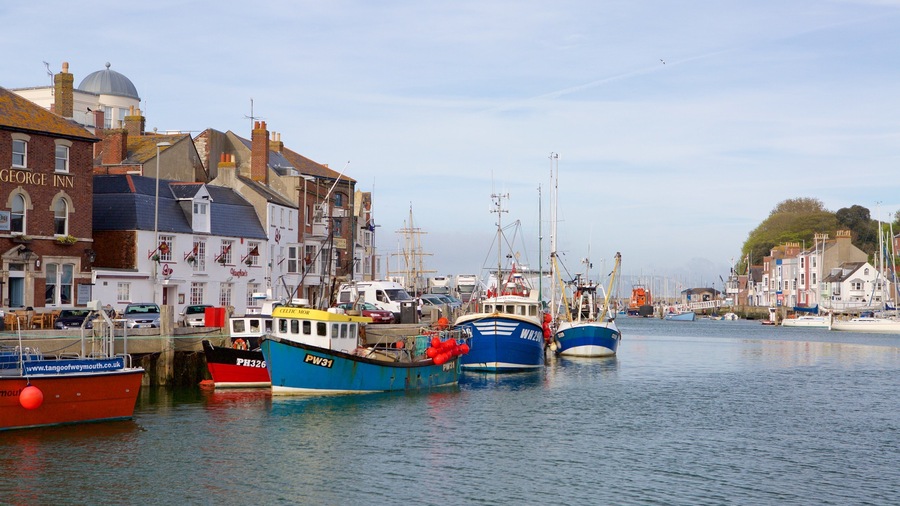 Weymouth showing a coastal town, a river or creek and heritage architecture