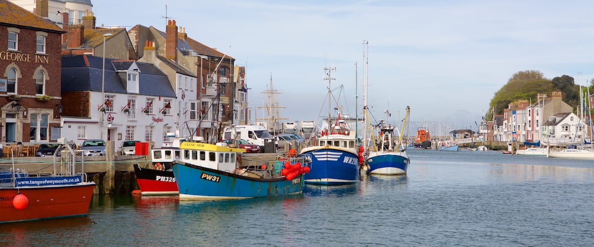 Weymouth which includes a coastal town, heritage architecture and a river or creek