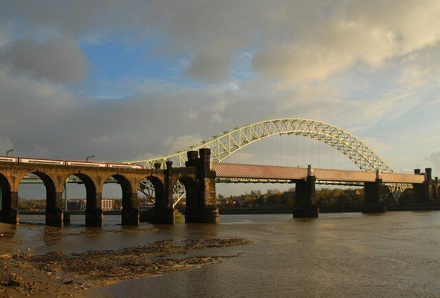 Britannia and Jubilee bridges Virgin train crossing the Britannia railway bridge with the Jubilee road bridge behind.