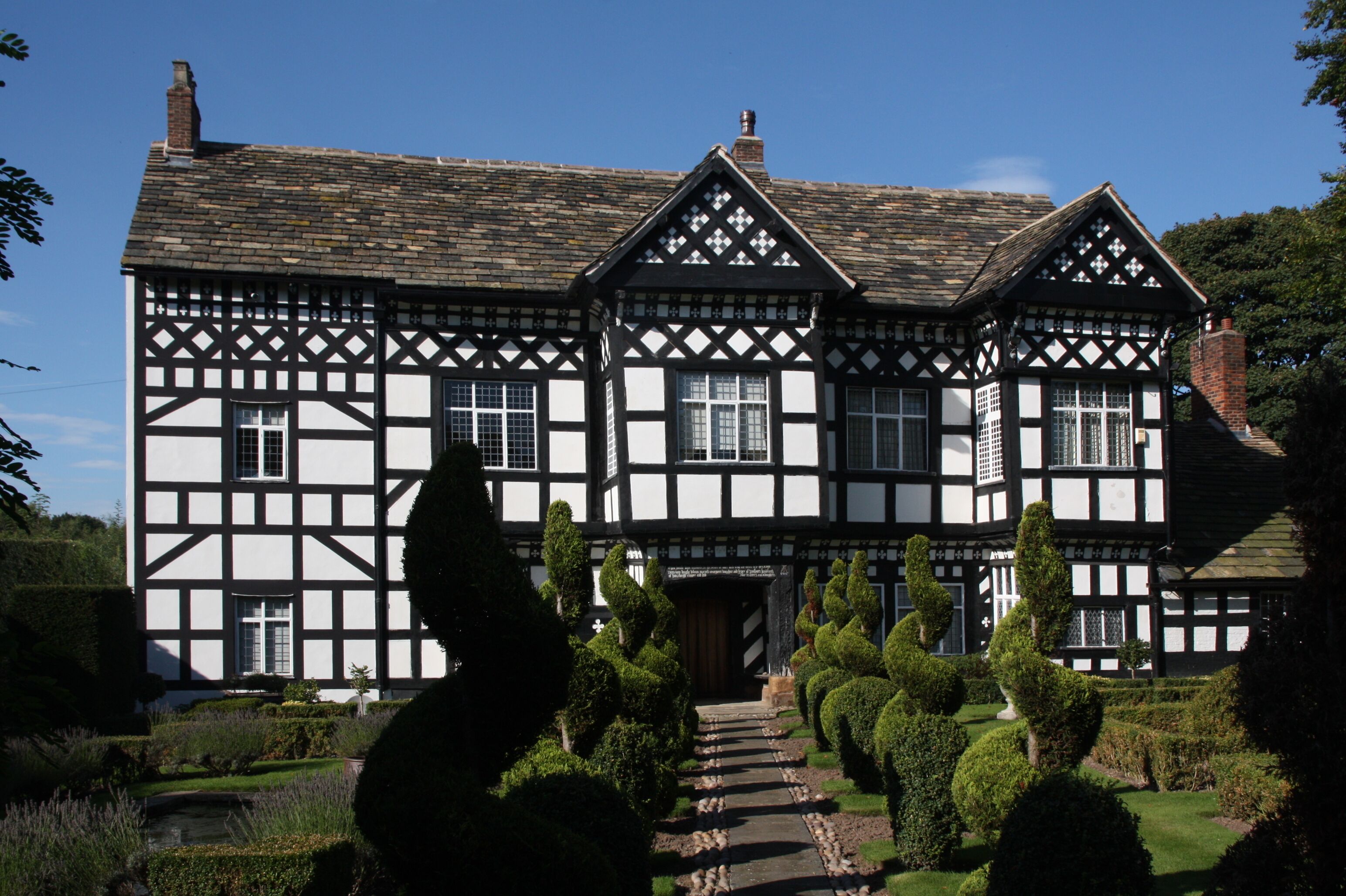 Handforth Hall is a grade II* listed building in Handforth, Cheshire. A view of the front façade.