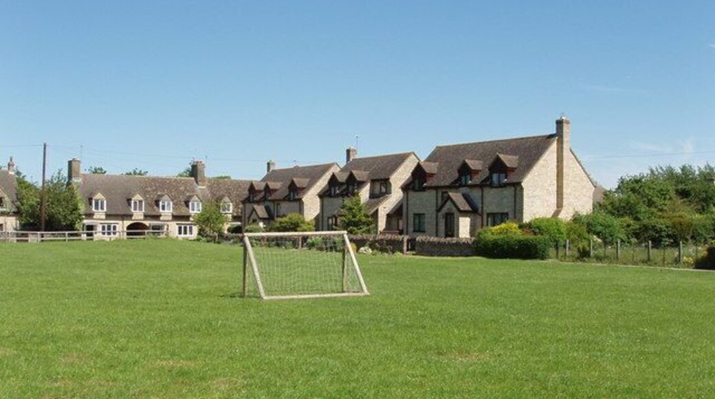 The Green, Stanton Harcourt The village kindly provided a bench in the shade of a tree where I ate my lunch with this pleasant view. On another bench were two cyclists with a tandem.