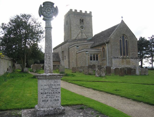 Church of England parish church of St Mary, North Leigh: view from the southeast past the war memorial.