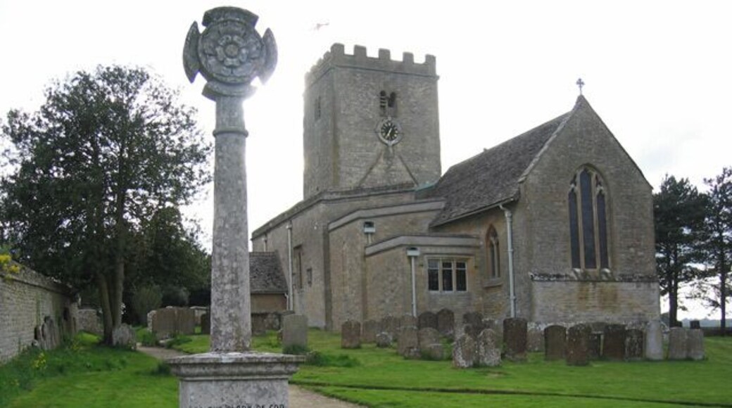 Church of England parish church of St Mary, North Leigh: view from the southeast past the war memorial.
