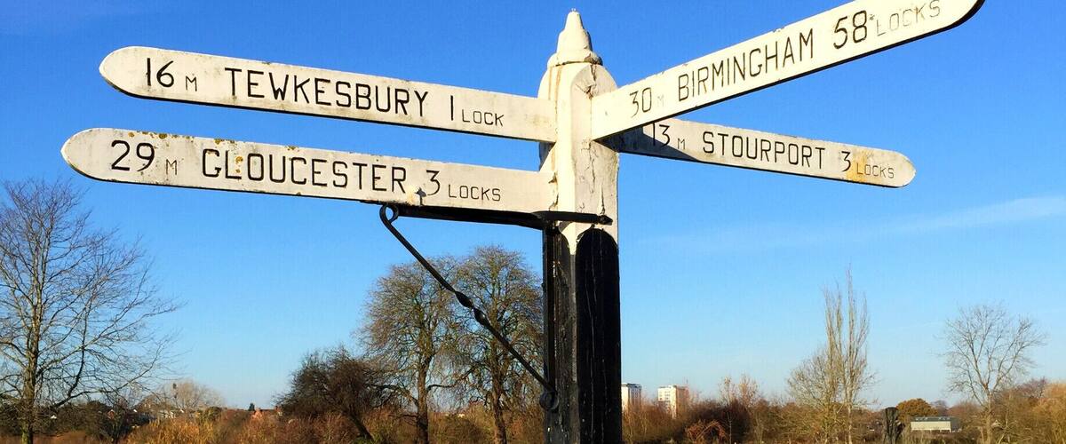 The canal signpost at the start of the Worcester and Birmingham Canal on the River Severn. Only 58 locks uphill to Birmingham!