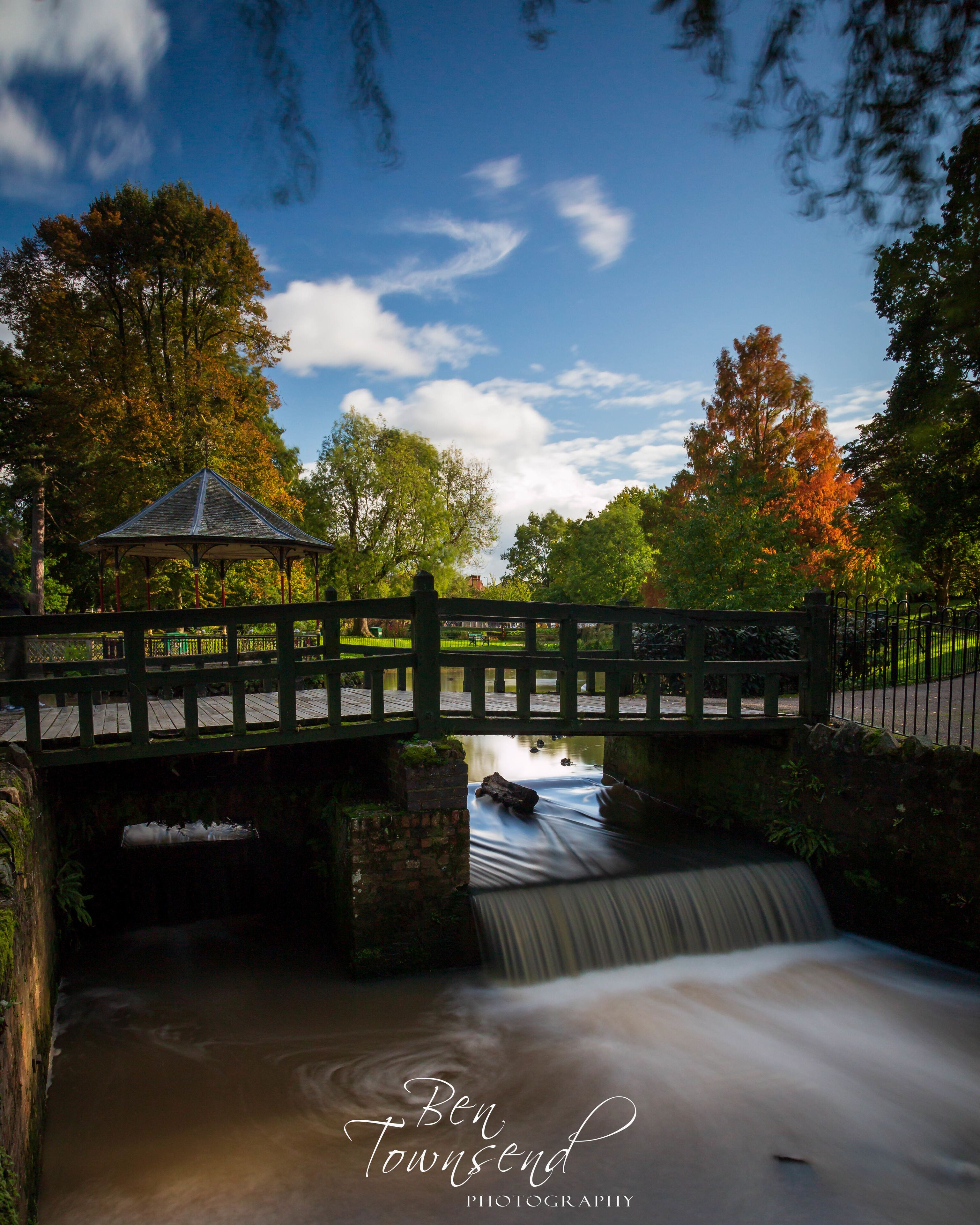 A park with a traditional bandstand and beautiful views.