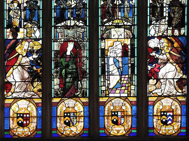 St Peter's church - east window detail. The church was extensively restored in the 1870s > 773236; its perhaps most noteworthy features are the stained glass windows, memorials to the Wodehouses of Kimberley Hall. The east window contains fragments of English and continental glass dating from the 14th and 15th centuries - see > 773246 for full view. A 1950s window in the north nave wall depicts episodes from the life of St Francis > 773251. The church is kept locked; a key is available. For more information see: http://www.norfolkchurches.co.uk/kimberley/kimberley.htm