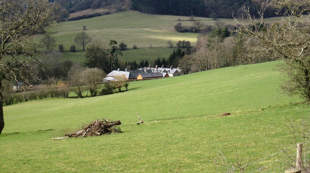 Hawnby Lodge This photograph shows a view of Hawnby Lodge. The wooded hill in the upper right-hand side of the image is Coomb Hill; the high ground to the left of this is Dale Town Common. The picture was taken looking in a westerly direction towards Church Bridge.