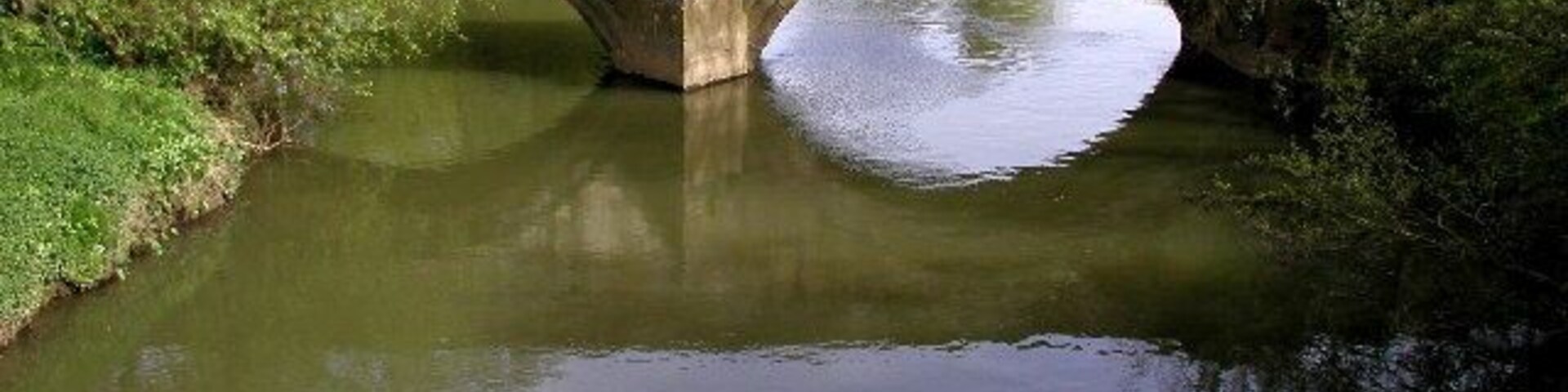 The old Kexby Bridge over the River Derwent forming the boundary between North Yorkshire and the East Riding of Yorkshire, England. MR: SE705511