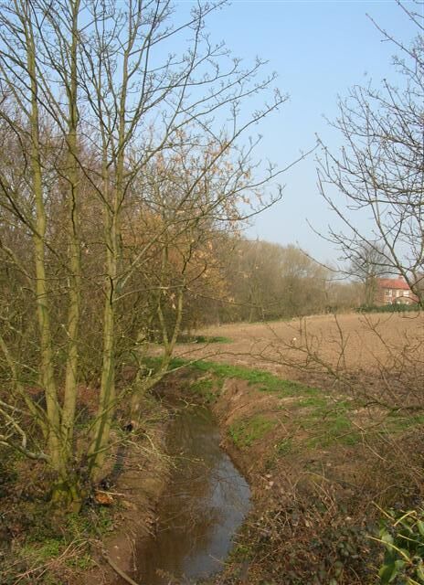 Small ditch A small bridge crosses this ditch on the Huby - Tollerton road. Electric wires pass overhead.