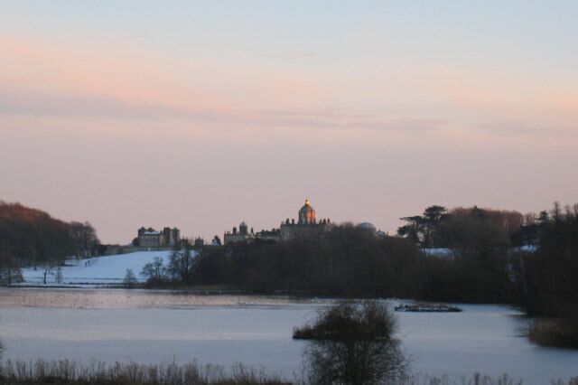 Winter Sunset at Castle Howard Frozen Great Lake and red sky over Castle Howard.