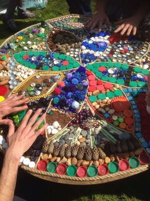 Beautiful Mandala made from plastic lids, shells , corks , stones , cones , beads and more !