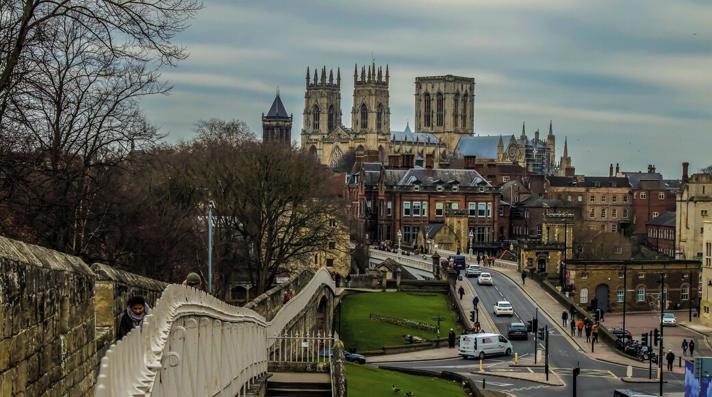 A view from York walking around the protective wall which runs around the City of York. At this point you are look at York Minster the three large towers