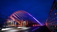 The Millennium Bridge over the River Ouse is li up at night with coloured LEDs. #yorkshire #york #riverouse #Bridge #illuminated