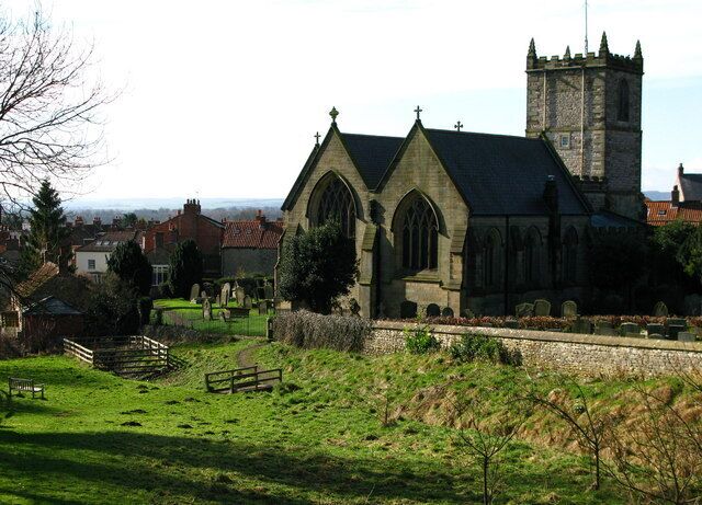 Community Garden at Kirkbymoorside Adjacent to All Saints' Church this Community Garden contains mosaics made by children from the nearby Primary School.