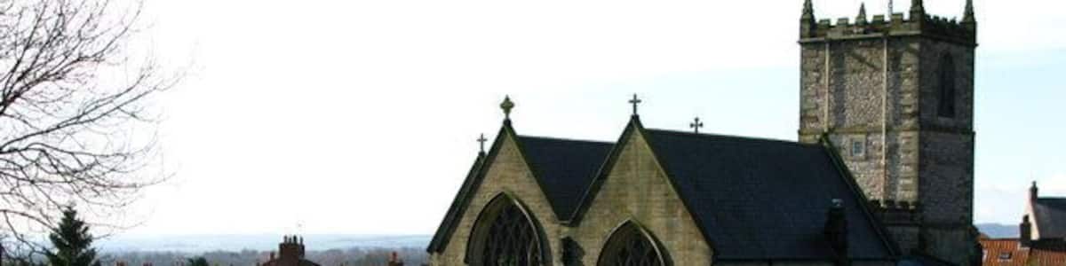 Community Garden at Kirkbymoorside Adjacent to All Saints' Church this Community Garden contains mosaics made by children from the nearby Primary School.