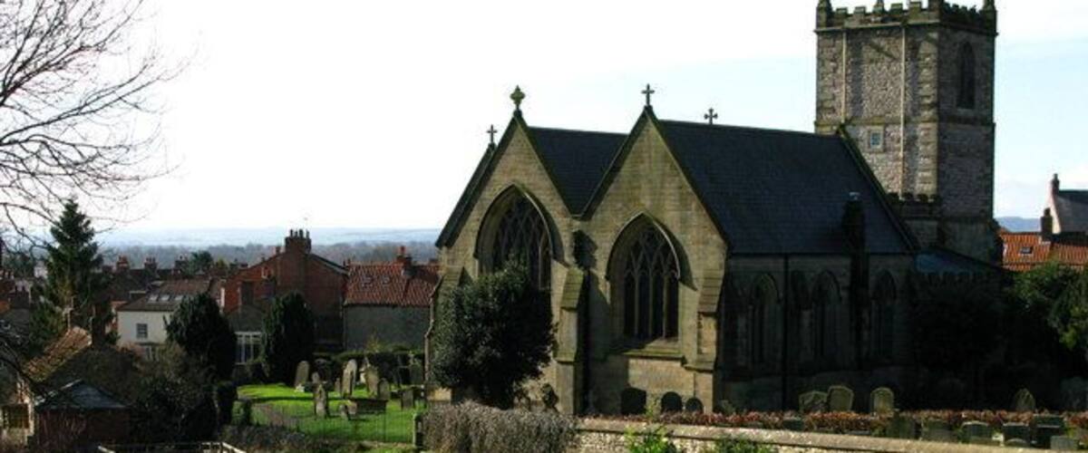 Community Garden at Kirkbymoorside Adjacent to All Saints' Church this Community Garden contains mosaics made by children from the nearby Primary School.