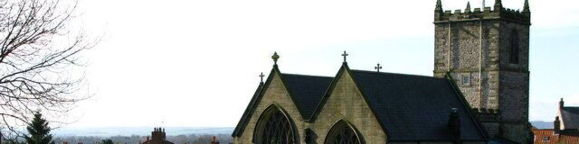 Community Garden at Kirkbymoorside Adjacent to All Saints' Church this Community Garden contains mosaics made by children from the nearby Primary School.
