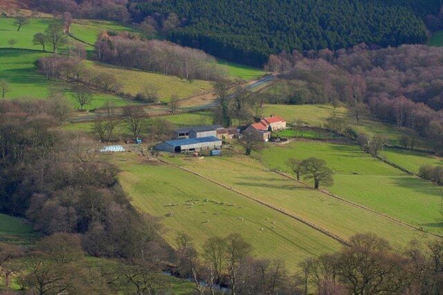 Feather Holm Farm Nestling at the foot of Newgate Bank. Seen from across Bilsdale.