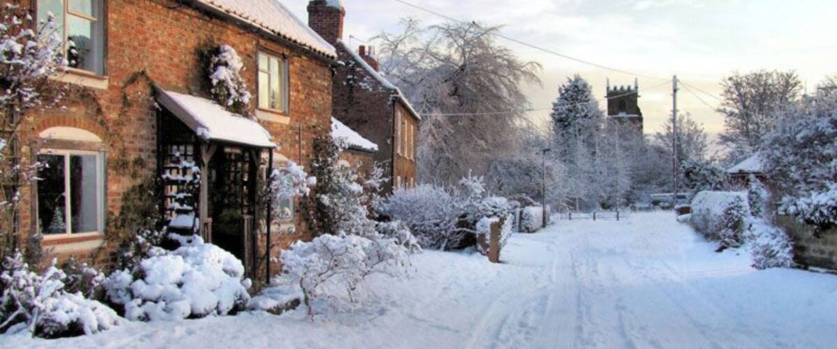 Wilberfoss in the snow. Middle Street Wilberfoss with the church over the Beck in the distance. See 399308