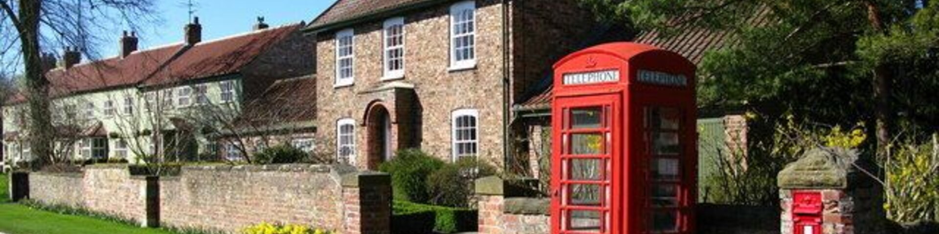 Roecliffe Village The postbox is Victorian.
