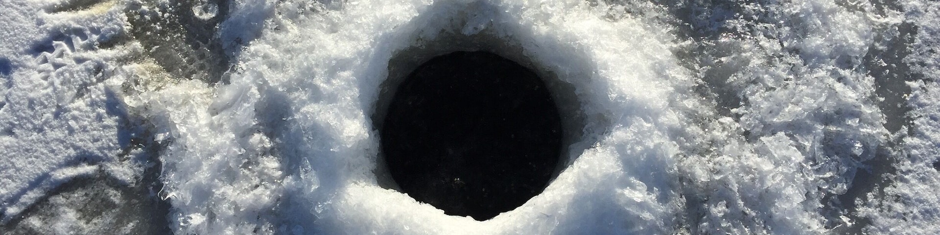 Holes like this are for the patient fishing experience on the cold but sunny days! Colorado has so much to offer!!