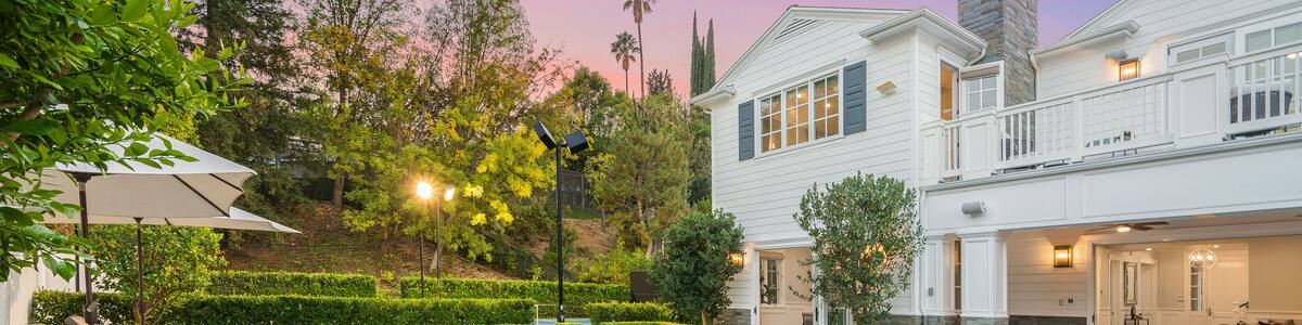 Swimming pool in front of a new construction home in Encino, California