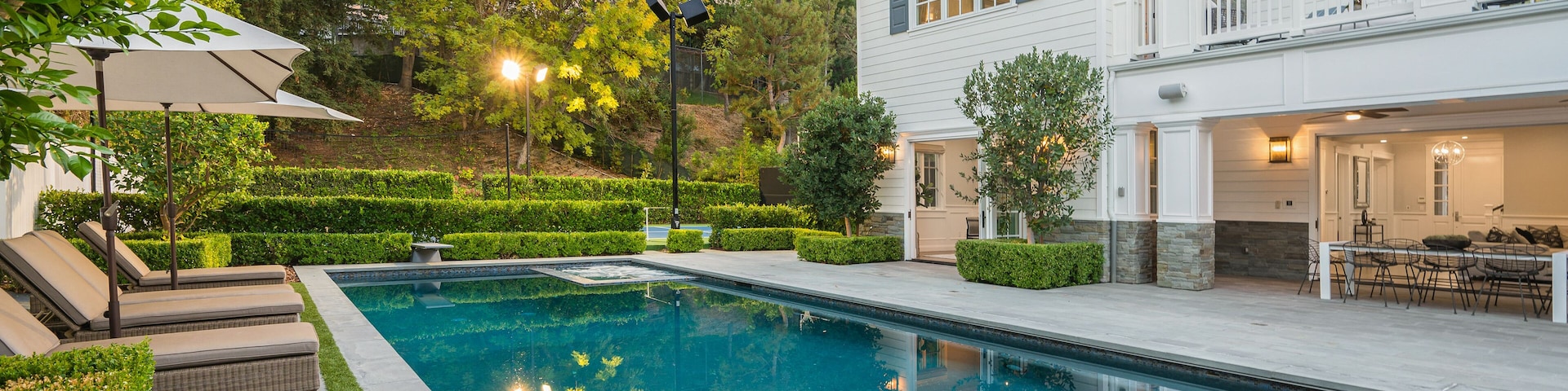 Swimming pool in front of a new construction home in Encino, California
