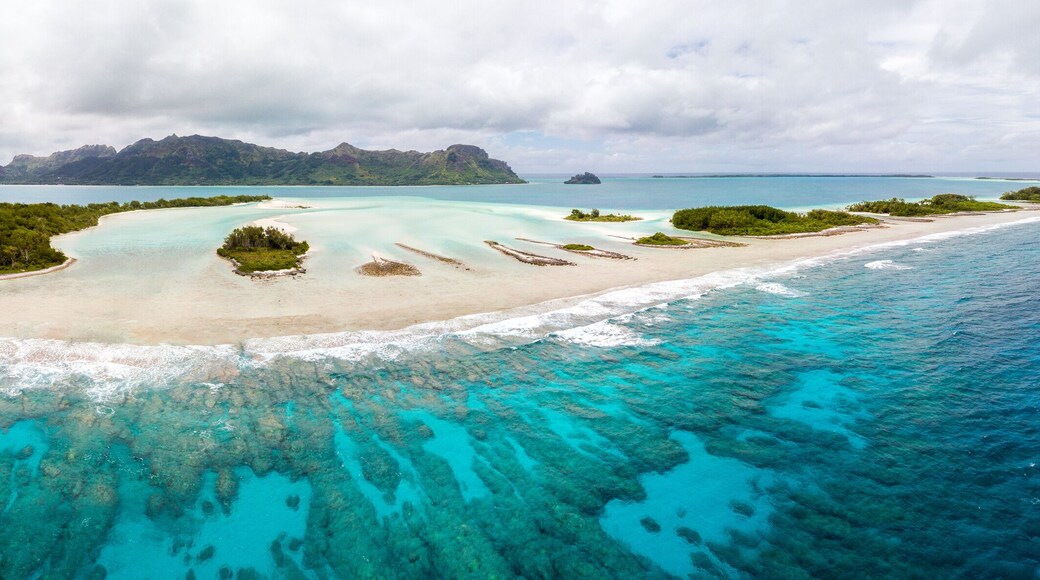 Aerial view of Raivavae island with beaches, coral reef and motu in azure turquoise blue lagoon. Tubuai Islands (Austral ), French Polynesia, Oceania